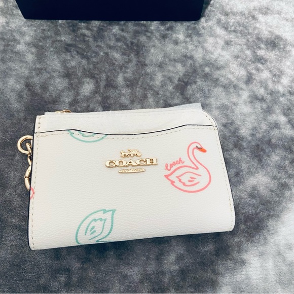 Coach Handbags - Coach L Zip Card Case With Swan Print